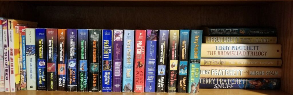 Terry Pratchett books on a shelf